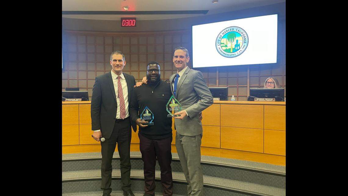 Outgoing members of the Merced City Council Delray Shelton, center, and Kevin Blake, right, are shown with Merced Mayor Matt Serratto, left.
