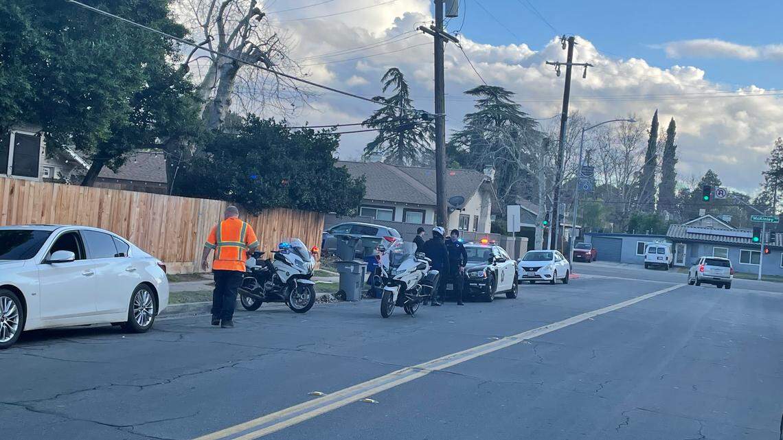 At Echo and McKinley avenues Sunday, Fresno police prepare to impound a car suspected of a traffic violation related to sideshow activity.