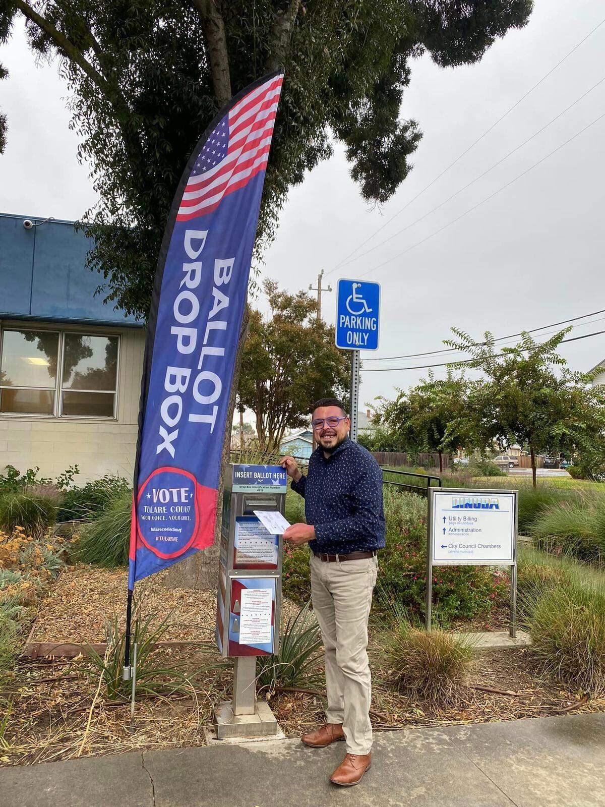 Tulare County Supervisor Eddie Valero drop-off his ballot as he seeks seeks second term to represent District 4.