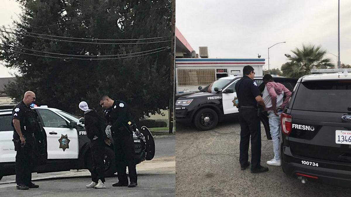 Fresno police officers take two juveniles into custody after a 54-year-old man was attacked with an electronic stun device and robbed Tuesday in southwest Fresno. A total of five  juveniles were reportedly involved in the crime.