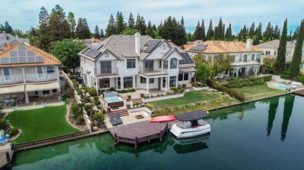 A Fresno home with a lakefront view is for sale, with an asking price of just under $1.4 million. The home at Woodward Lake in northeast Fresno is 4,197 square feet with five bedrooms and five bathrooms. And it has direct access to the waterway from the backyard.