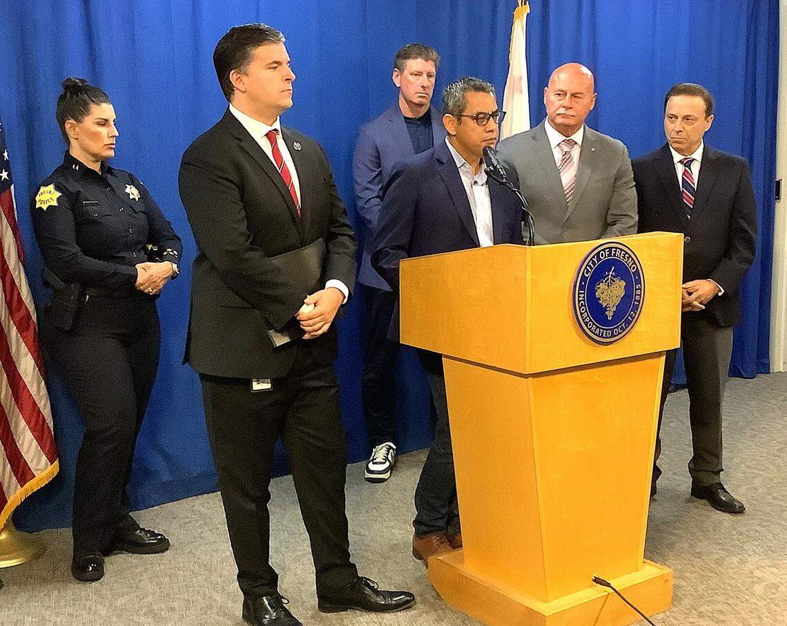 Fresno City Councilmember Miguel Arias, at microphone, discusses the city’s new homeless camping law that took effect Monday, Sept. 23, 2024, as Police Chief Mindy Casto, Councilmember Tyler Maxwell, Fresno Mission CEO Matt Dildine, Mayor Jerry Dyer and Councilmember Garry Bredefeld look on during a press conference Monday at Fresno City Hall.