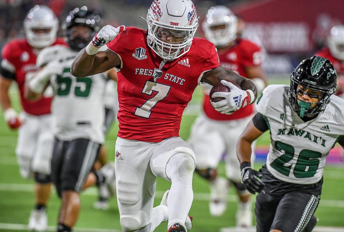 Fresno State’s Jordan Mims hops into the end zone for a touchdown against Hawaii in the first half of their game at Valley Children’s Stadium on Saturday, Nov. 5, 2022.