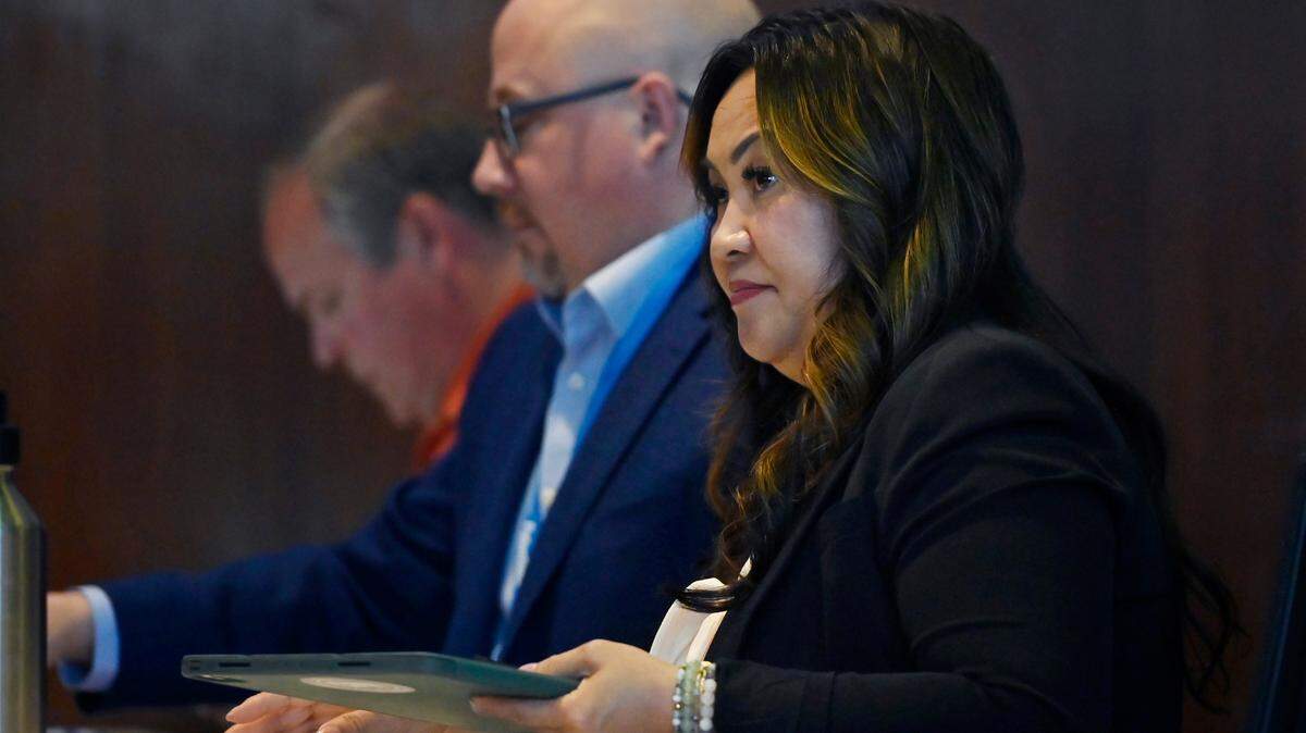 Fresno Unified’s Deputy Superintendent Mao Misty Her, right, listens to the board during a meeting Wednesday, May 1, 2024 in Fresno.