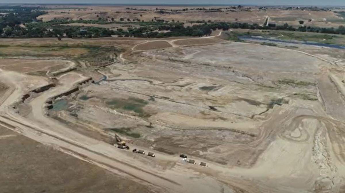 The CEMEX Rockfield Quarry site northeast of Fresno is shown in this June 2020 drone image from video looking southwest from above Friant Road toward the San Joaquin River. CEMEX is seeking a four-year extension of its sand- and gravel-mining operations through mid-2027.