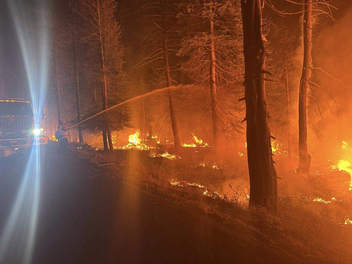 Fire crews battle the Garnet Fire in eastern Fresno County, which had burned nearly 50,000 acres as of Monday, Sept. 8, 2025.