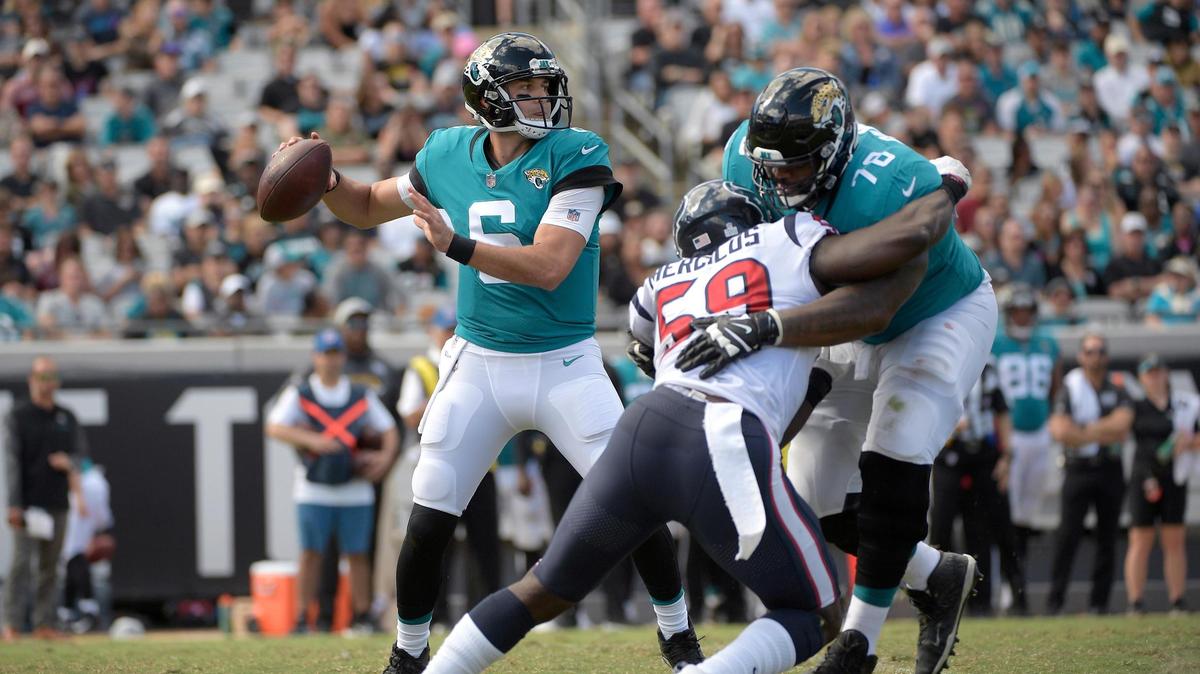 Jacksonville Jaguars quarterback Cody Kessler (6) sets up to throw a pass as offensive tackle Jermey Parnell (78) blocks Houston Texans linebacker Whitney Mercilus (59) during the second half of the Texans’ 20-7 victory Sunday, Oct. 21, 2018, in Jacksonville, Fla. Kessler, from Bakersfield, will start this week against the Indianapolis Colts.