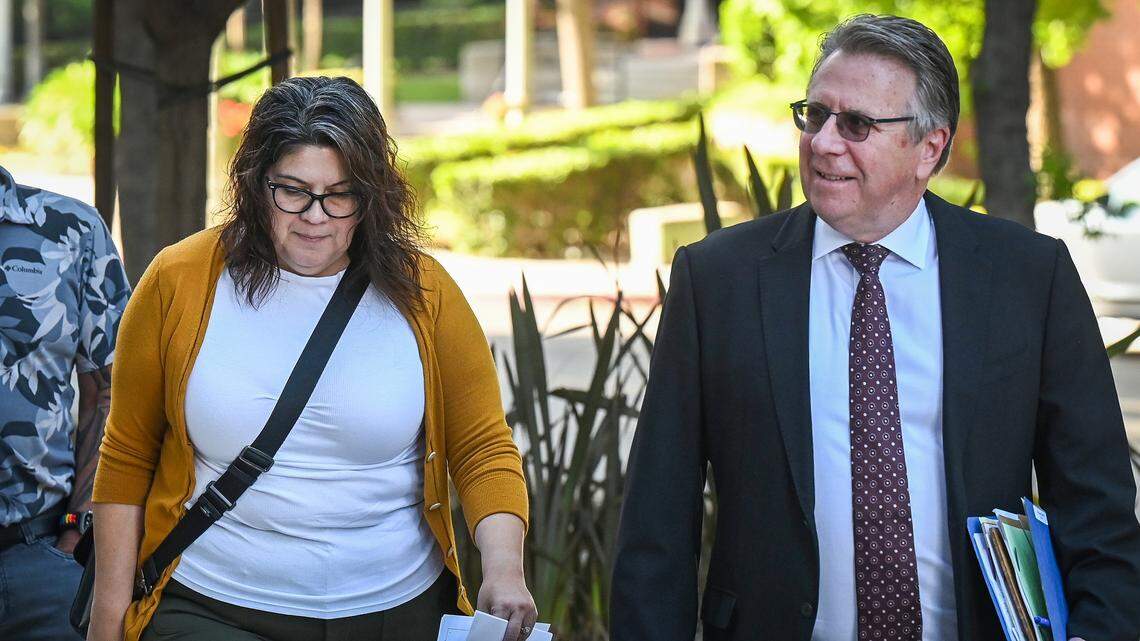 Suliana Caldwell, the former operations manager for Fresno Arts Council, arrives at the Robert E. Coyle United States Courthouse with her lawyer on Monday, April 20, 2026.