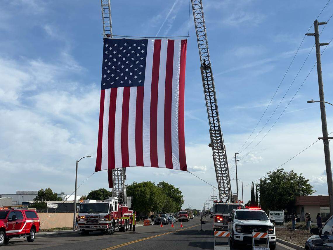 A U.S. flag outside the Tulare County Coroner’s Office, where the body of a deputy killed in the line of duty in Porterville was taken on Thursday, April 9, 2026.