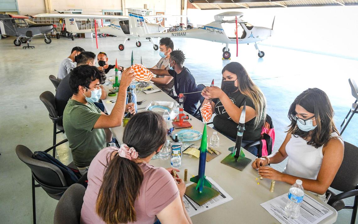 High school aviation camp students work on constructing rockets in the summer camp class at Chandler Executive Airport in Fresno on Tuesday, June 15, 2021.