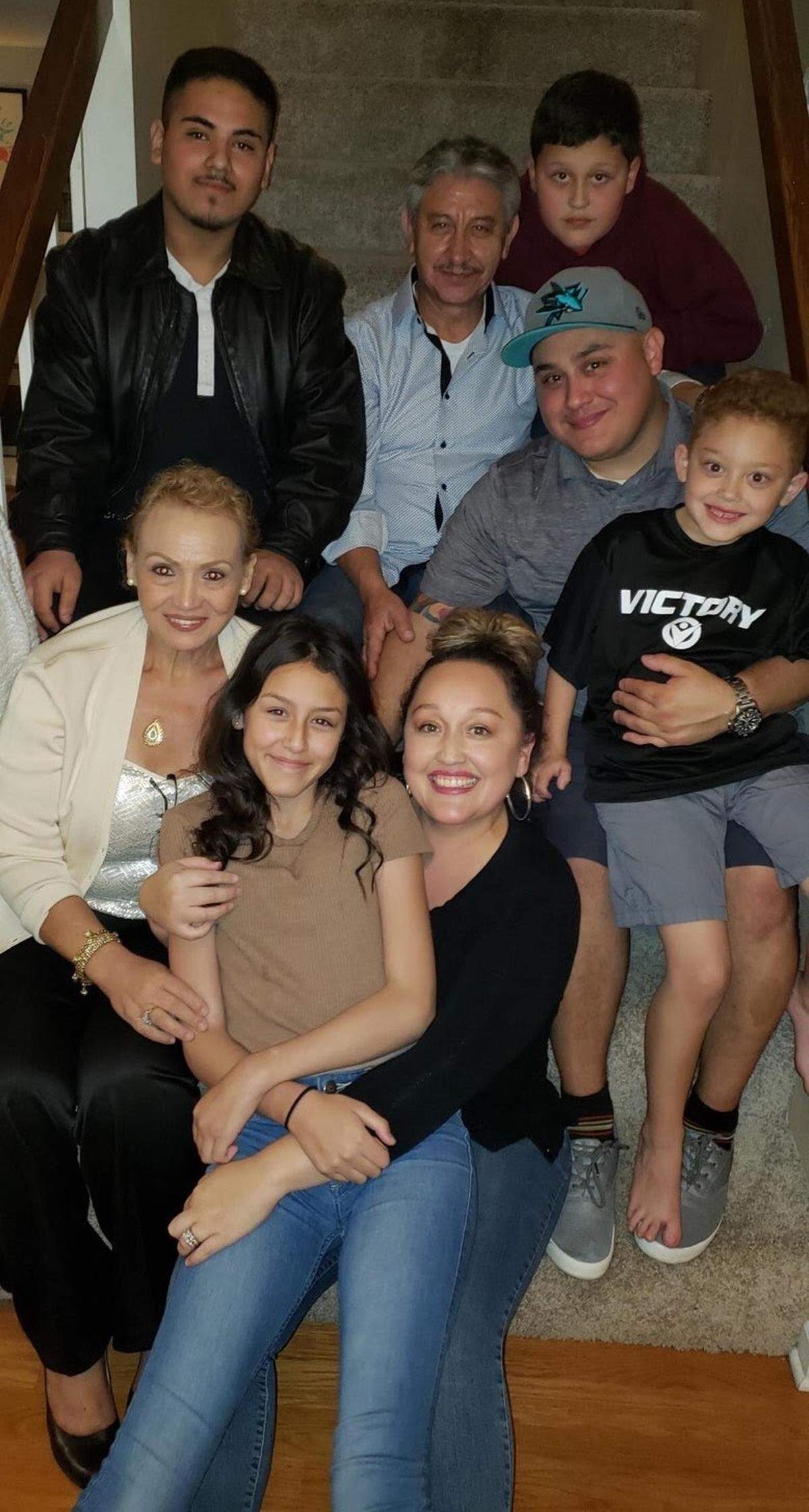 Jesus Salazar (top, center) is photographed with his son, Richard Castillo, his daughter-in-law, Lina Castillo, his grandchildren Paris, Roman and Landon, and other family members in an undated photo.