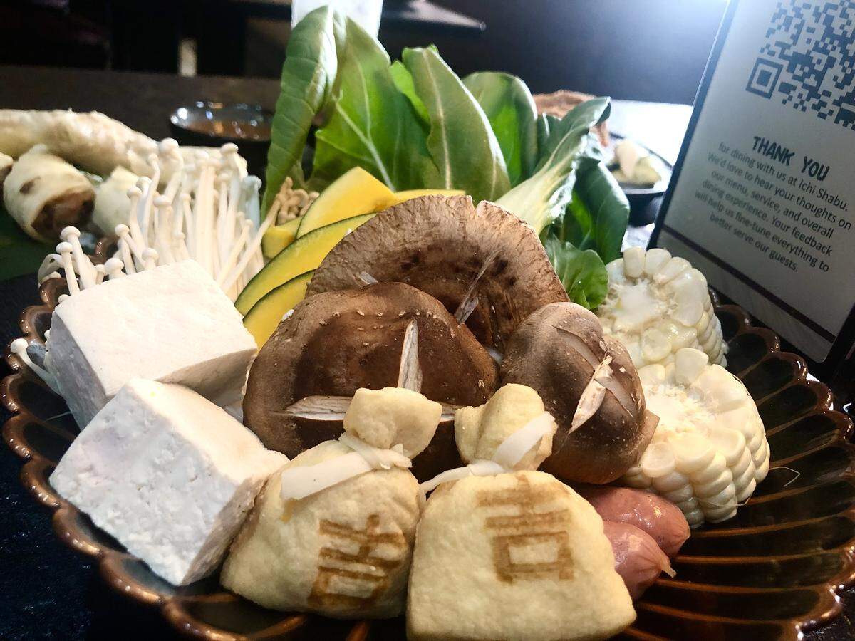 Ichi Shabu, the new Japanese shabu shabu restaurant at Campus Pointe in Fresno, offers a variety of fresh vegetables to toss in one’s hot pot. Among them are enoki mushroom, corn, crown daisy, money bag (tofu dumpling style pouch), Chinese sausage, kabocha and shiitake.