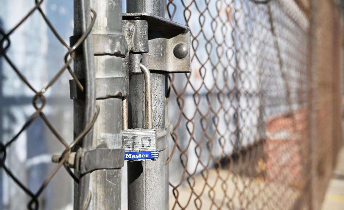 A padlock from the Reedley Fire Department, placed by Reedley code enforcement officer Jesalyn Harper is seen at the warehouse that Chinese company Prestige Biotech had illegally used for storage, photographed Monday, July 31, 2023.