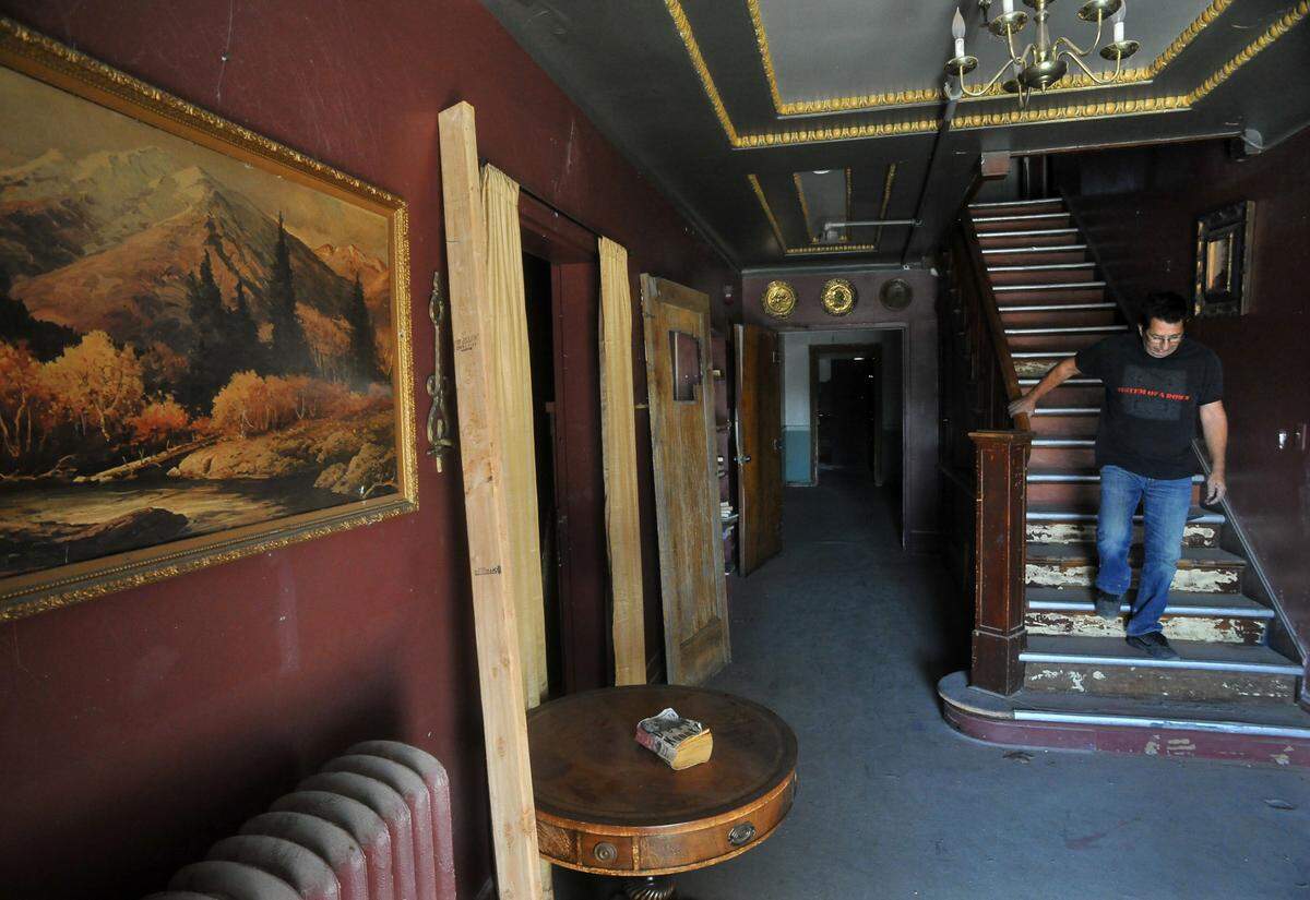 John Gamoian patrols the old Clovis Sanitarium, also known as Wolfe Manor, for break-ins from vandals in 2013.