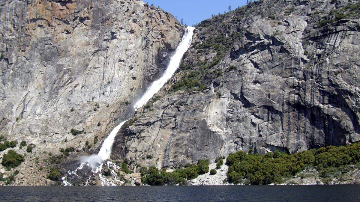 Wapama Fall flows into Hetch Hetchy Reservoir in Yosemite National Park, California on May 16, 2012.