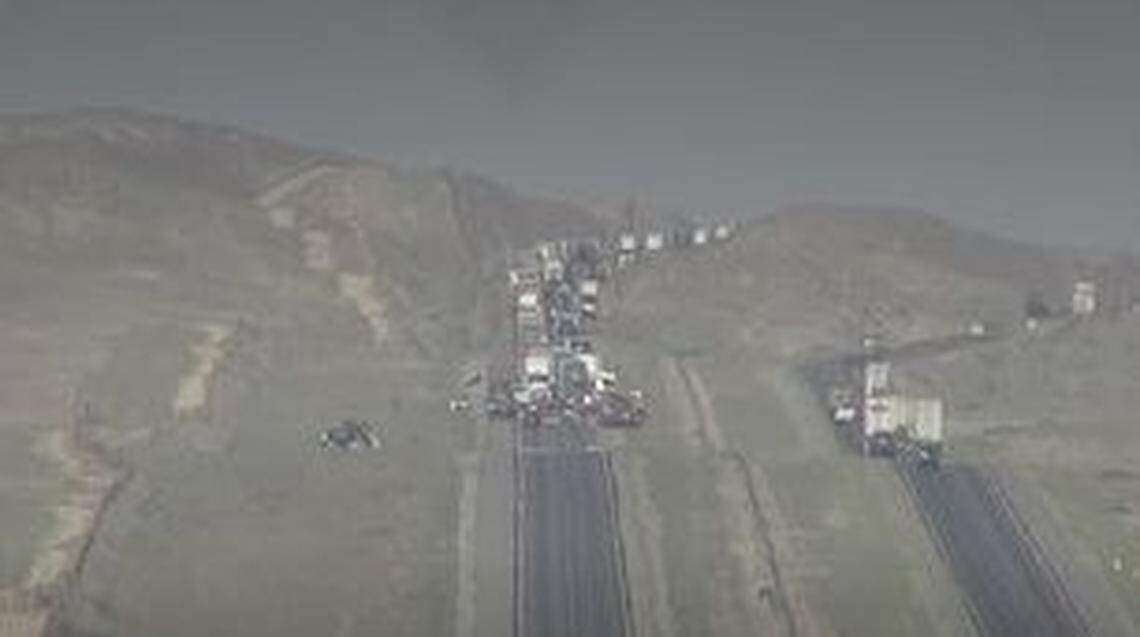 A Caltrans camera screengrab of Interstate 5 near Derrick Avenue where a crash that killed four has shutdown the southbound side, California Highway Patrol said Wednesday, March 2, 2022.