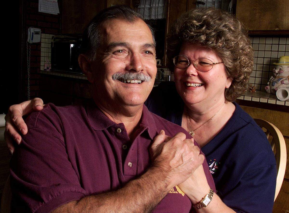 John Souza with his wife Sharon at their home south of Easton, shortly after he retired and wrote a book about the Ewell family murders.