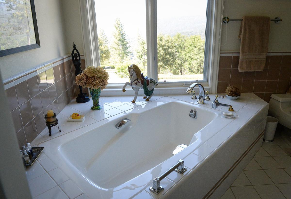 A tub with views of the Sierra Nevada mountains is one of the features in the European-style estate built in 1993 by Erna Kubin-Clanin, the former owner of Erna's Elderberry House, and her husband René Clanin.