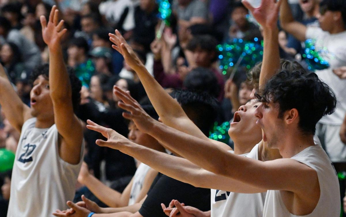 Clovis East’s sideline celebrates a point against Clovis High in the Central Section Division I volleyball championship Thursday, May 11, 2023 in Clovis.
