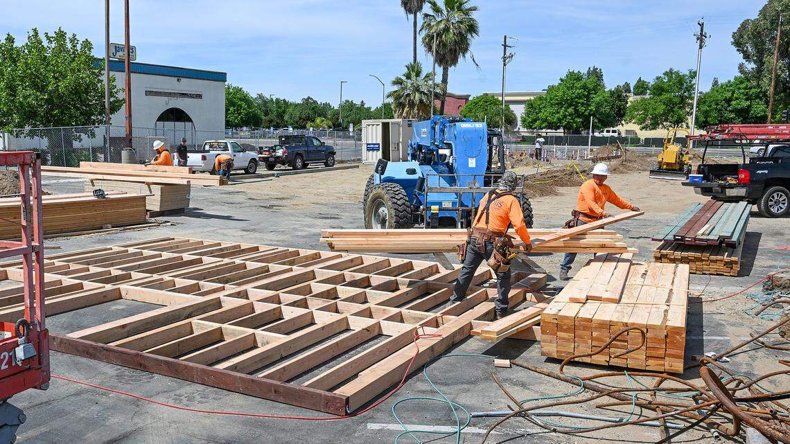 Workers begin construction on a new Dutch Bros Coffee store going up near the old Javier's on Kings Canyon east of Clovis Avenue on Wednesday, April 15, 2026.