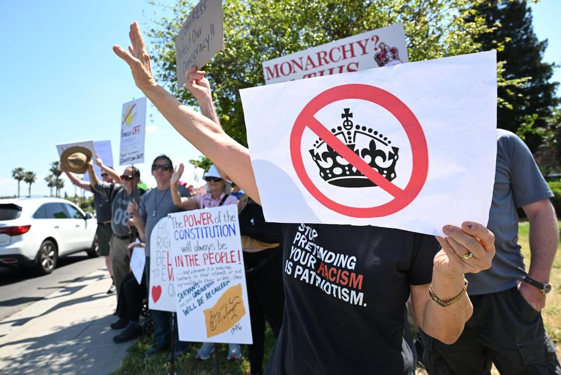 Arojund 400 gathered at the corner of Shaw and Clovis avenues for a Hands Off rally with the theme No Kings Saturday, April 19, 2025 in Clovis.