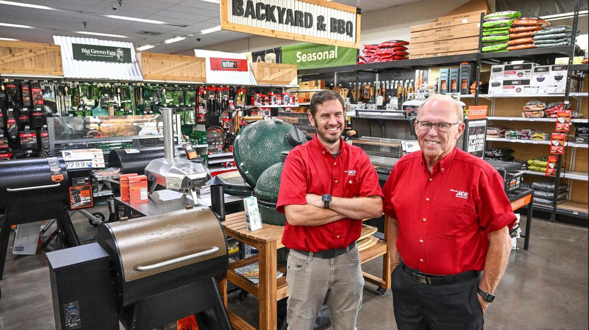 Co-owner Steve Bassett, right, and manager Adam Kusener stand in the expanded barbecue department at Clovis Ace Hardware in Clovis on Thursday, Sept. 7, 2023. After 10 years in business, the True Value hardware store has remodeled and switched to Clovis Ace. They have brought in some new products including Traeger and Big Green Egg barbecues in their expanded backyard and barbecue department as well as Benjamin Moore paints and frozen pies from The Pie Company of Ripon.