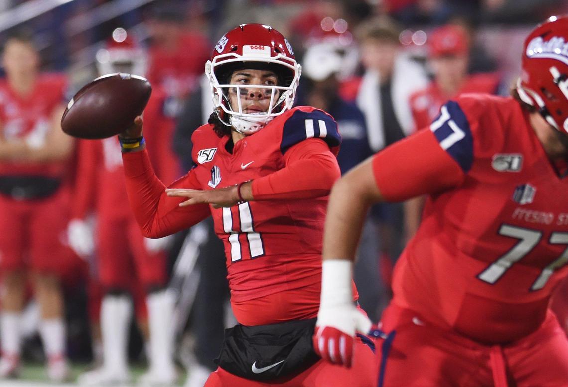 Fresno State quarterback Jorge Reyna throws a pass in a 35-28 loss to Nevada Saturday, Nov. 23, 2019 in Fresno. Reyna completed 27 of 37 passes for 261 yards with three touchdowns and one interception.