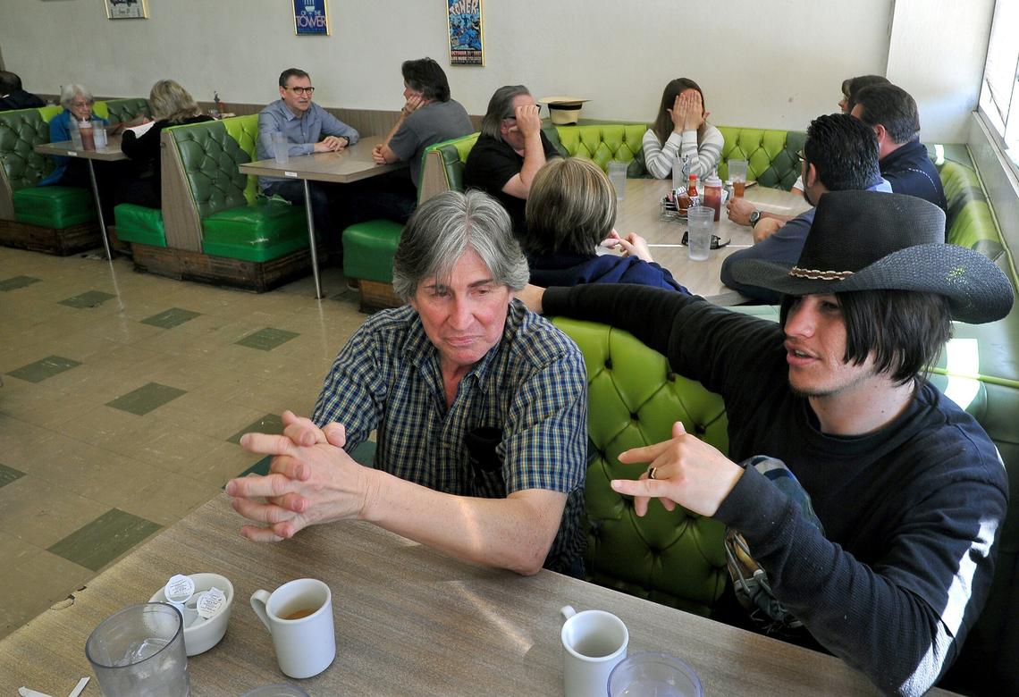 Rudy Valdez, left, a long-time customer of The Chicken Pie Shop, waits for lunch with his son, John Valdez, Tuesday, March 26, 2019. Rudy said he has come to the iconic Tower District restaurant since he was a child. It will be closing for good on Sunday after being open in the same location since 1956, and next door for 10 years prior to that.