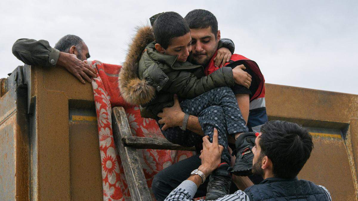 Refugees flee Nagorno-Karabakh in September, 2023 after attacks by Azeri forces.