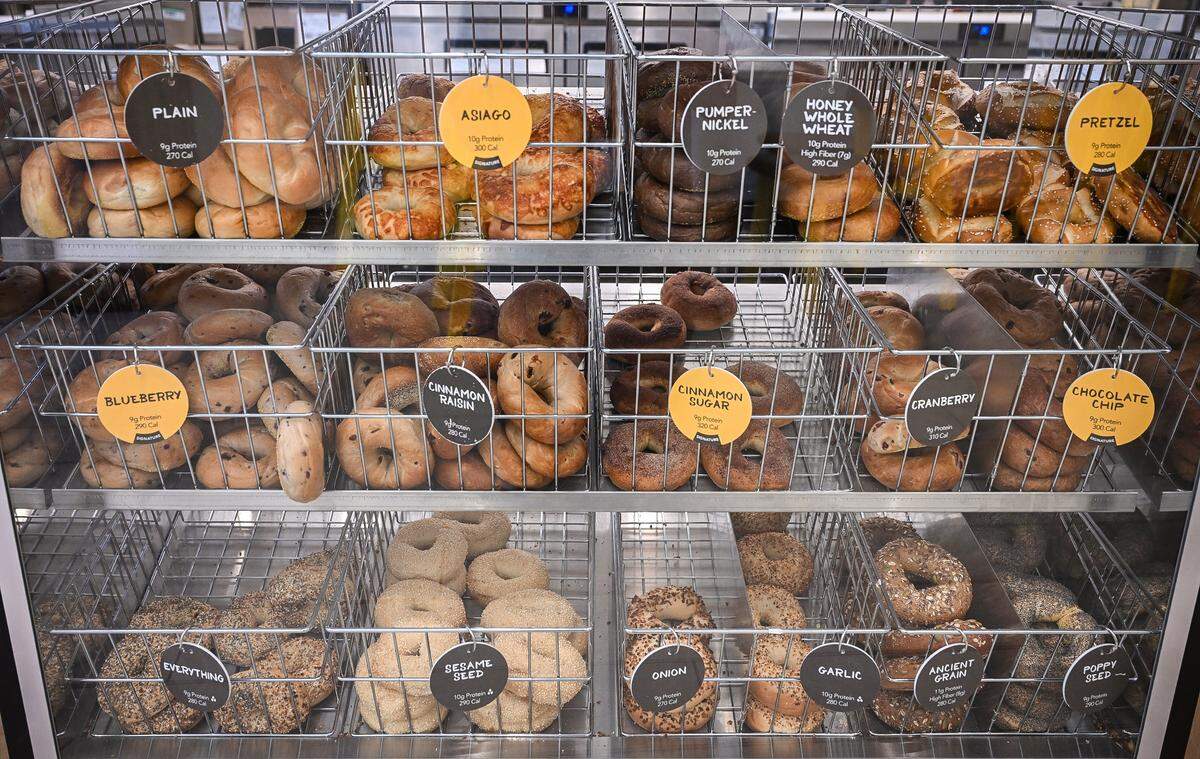 Various bagel flavors are stacked in bins at the front counter at Einstein Bros Bagels, which is now open near the Fresno Convention & Entertainment Center in downtown Fresno.