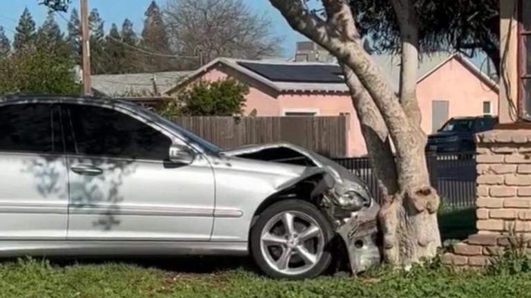 Tree blocks vehicle from crashing into Fresno apartment after multi-car collision
