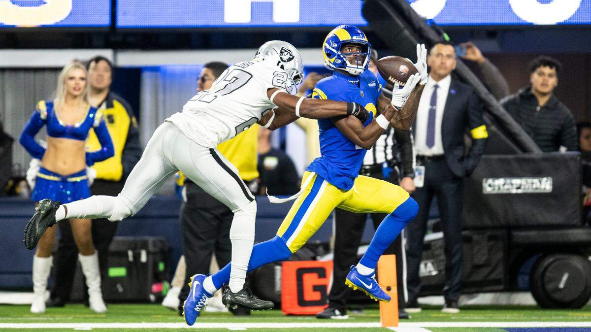 Los Angeles Rams wide receiver Van Jefferson catches a pass over Las Vegas Raiders cornerback Sam Webb (27) for a touchdown during an NFL football game, Thursday, Dec. 8, 2022, in Inglewood, Calif.