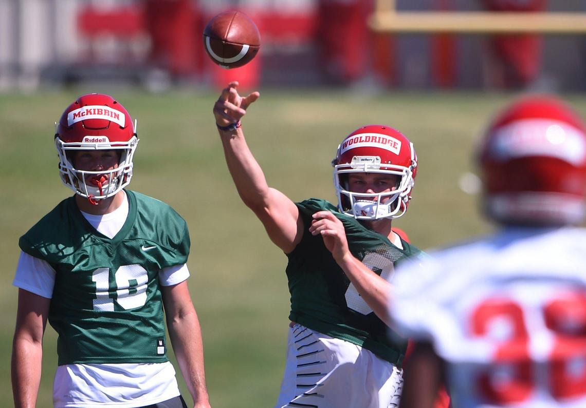 Fresno State quarterback Ben Wooldridge, center, throws a pass in practice last season. The redshirt sophomore will compete for the Bulldogs’ starting job with fourth-year junior Jake Haener when the Bulldogs get back on the football field.