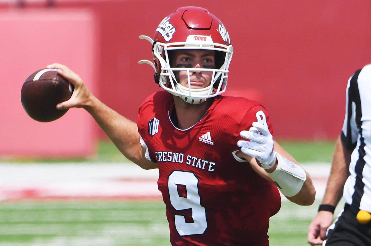 Fresno State quarterback Jake Haener looks to pass against UConn Saturday, Aug. 28, 2021 in Fresno. The Bulldogs led 31-0 at halftime.
