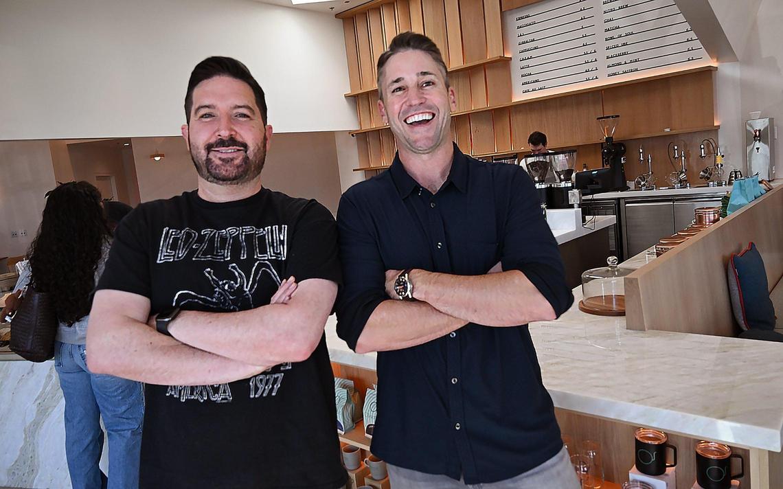 Adam Byrd, left, with Brandon Smittcamp, right, inside Otherside Cafe.