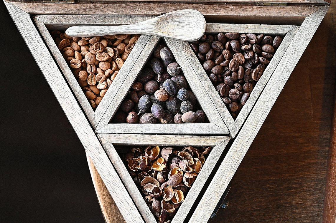 Coffee beans imported from Yemen, along with cascara, at bottom, the shelled beans, used to make a drink of the same name, at the Bab-Al-Yemen Coffee Shop.