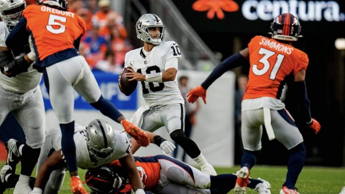 Las Vegas Raiders quarterback Jimmy Garoppolo looks to pass against the Denver Broncos on Sunday, Sept. 10, 2023.