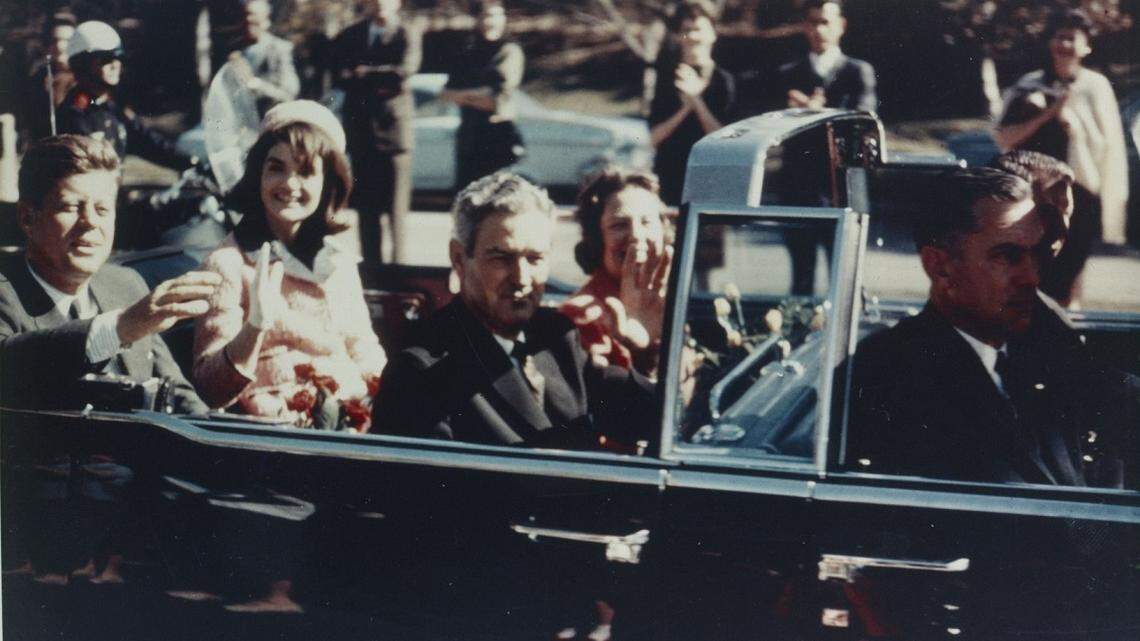 A photograph from Warren Commission exhibits shows the open limousine that carried President and Mrs. Kennedy through downtown Dallas in the moments before shots rang out. Texas Governor John Connally and his wife, Nellie, sat in front of them.