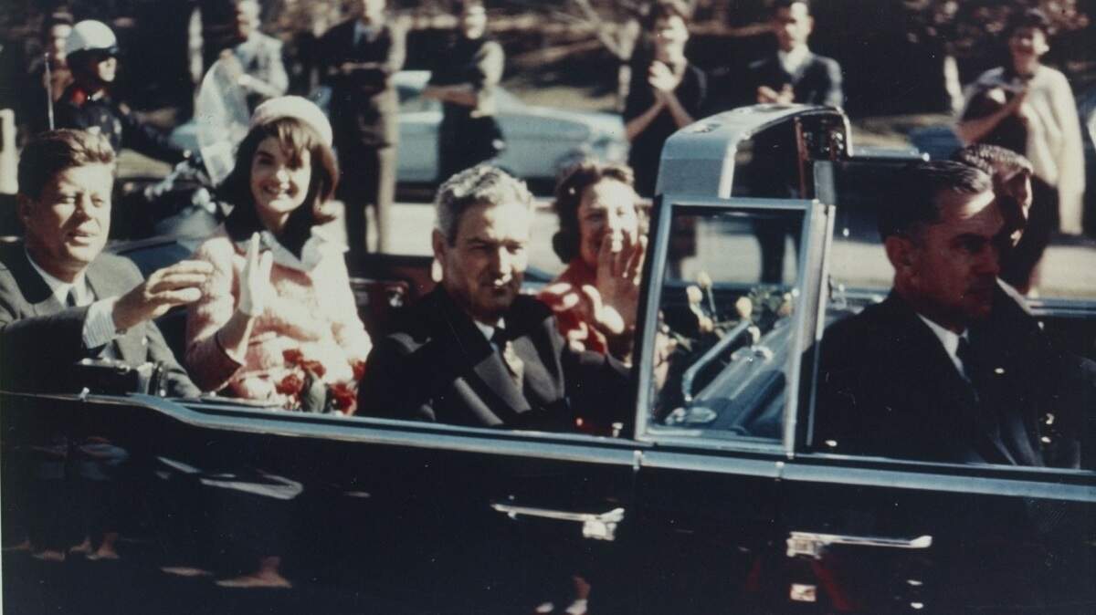 A photograph from Warren Commission exhibits shows the open limousine that carried President and Mrs. Kennedy through downtown Dallas in the moments before shots rang out. Texas Governor John Connally and his wife, Nellie, sat in front of them.