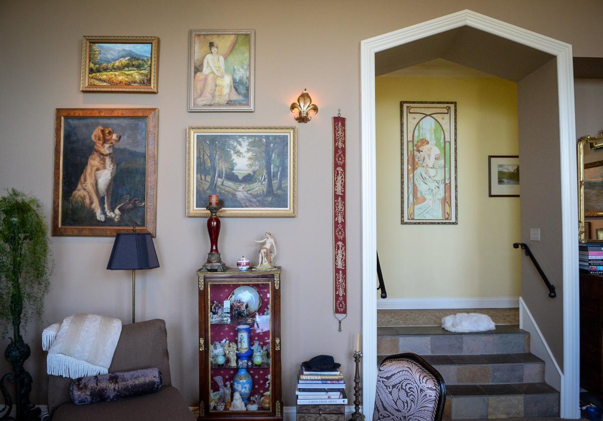 An elegant living room features an arched entry with lots of space for art in a French chateau built in 1993 by Erna Kubin-Clanin, the former owner of Erna's Elderberry House, and her husband René Clanin.