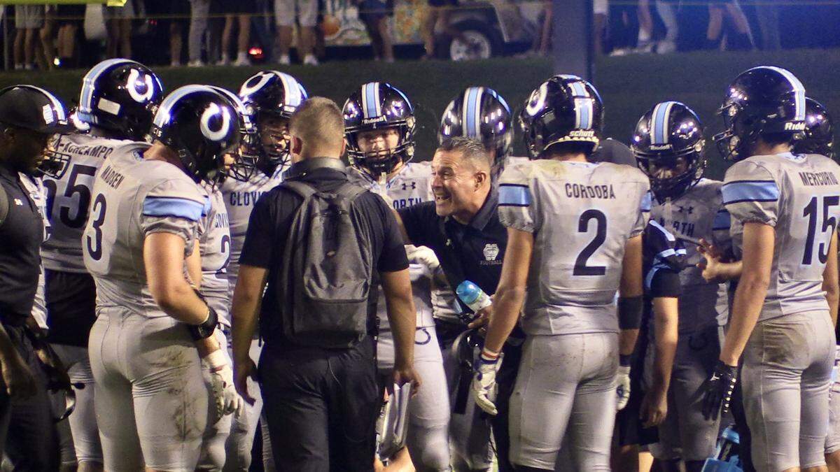 Clovis North coach Michael Jacot talks to his team during a high school football game against JSerra Catholic-San Juan Capistrano on Friday, Sept. 15, 2023 in Clovis, California.