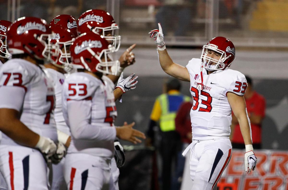 Fresno State running back Josh Hokit (33) celebrates after scoring on a 5-yard run in the Bulldogs’ 48-3 victory over the UNLV Rebels at Sam Boyd Stadium in Las Vegas Saturday, Nov. 3, 2018, in Las Vegas.