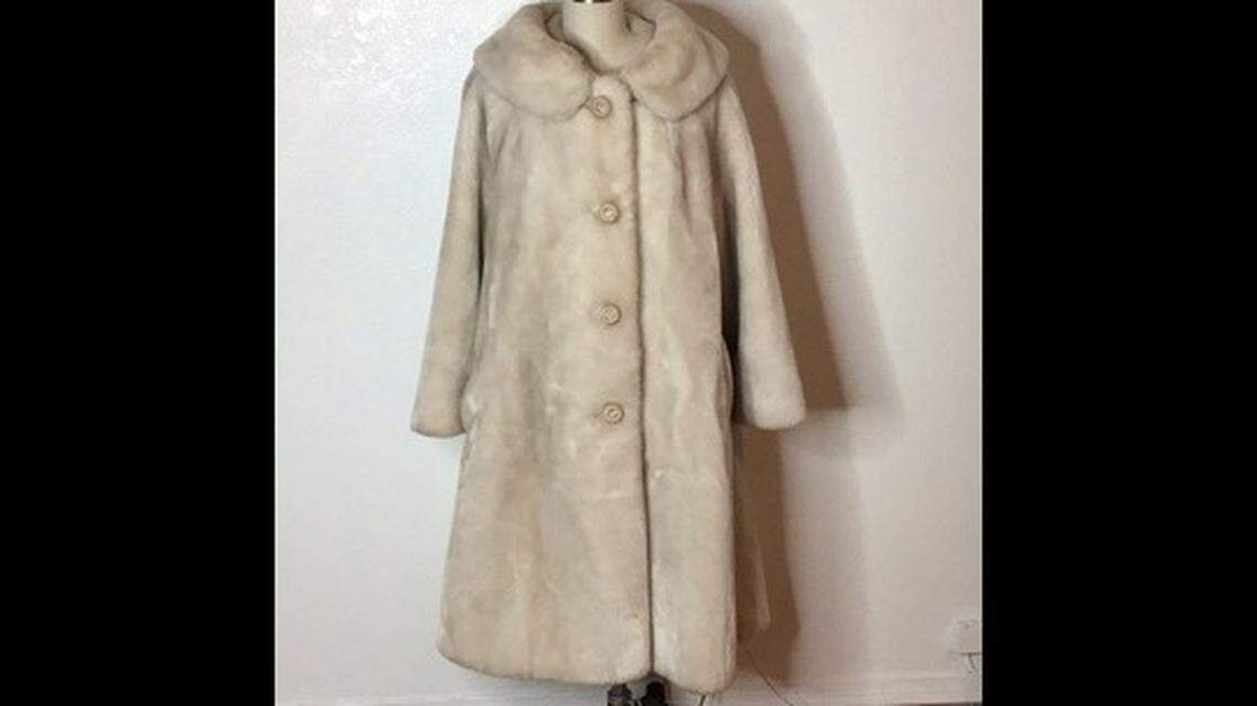 Neither snow, nor rain, nor gloom of fog shall chill this Valley woman with all her coats