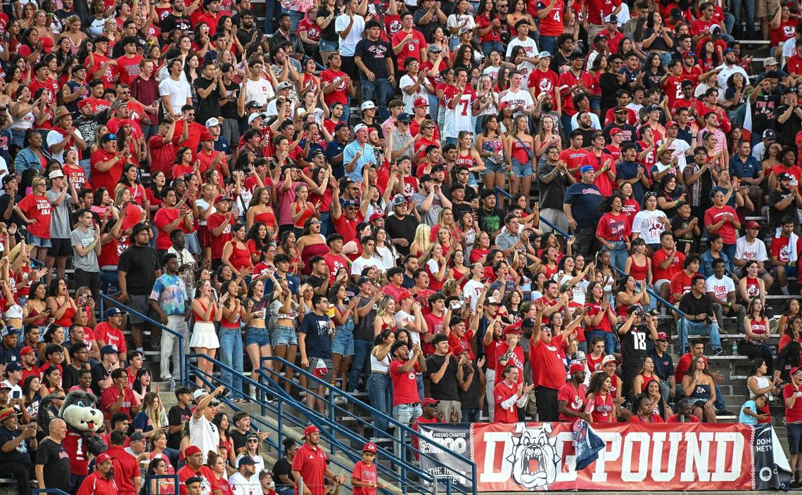 Fans in the student section’s Dog Pound cheer the Bulldogs during their first game of the season against Sacramento State at Valley Children’s Stadium on Saturday, Sept. 7, 2024.