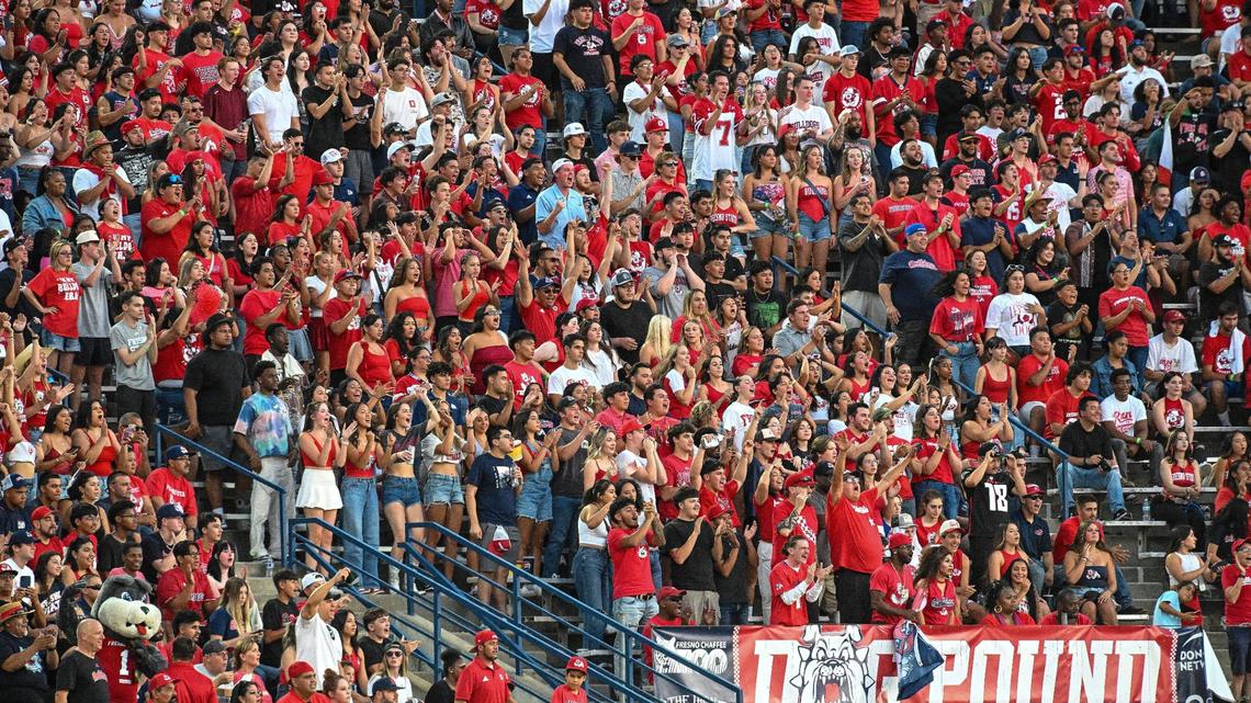 Fans in the student section’s Dog Pound cheer the Bulldogs during their first game of the season against Sacramento State at Valley Children’s Stadium on Saturday, Sept. 7, 2024.
