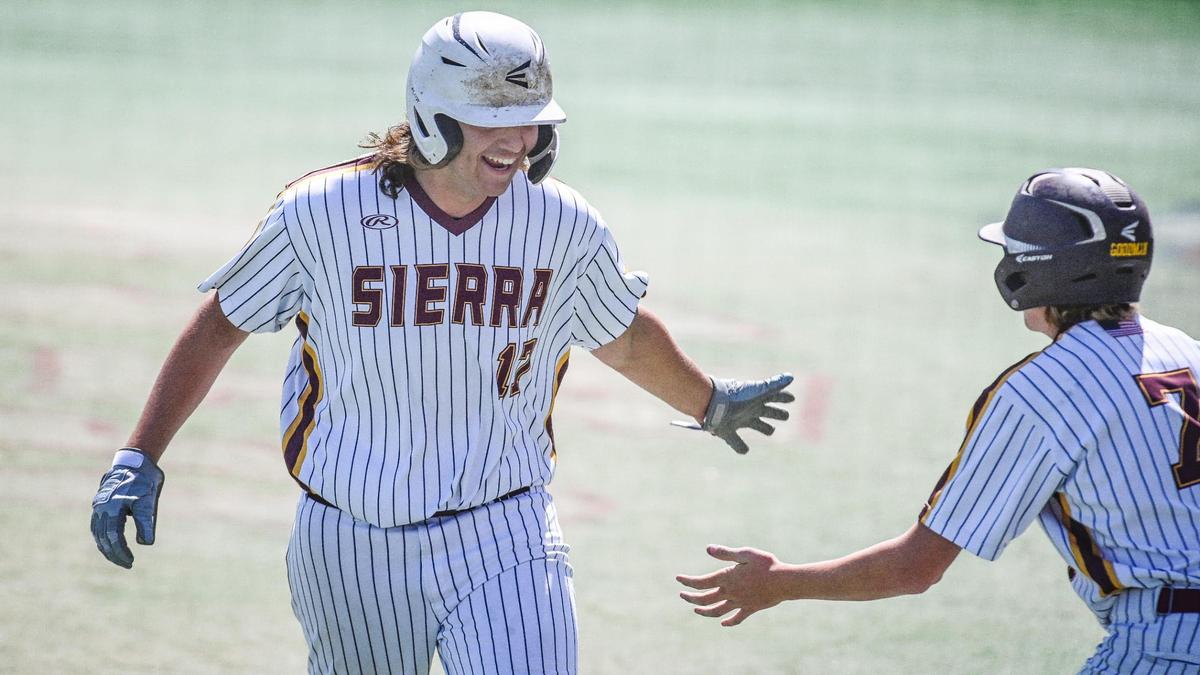 Sierra’s Noah Mitchell celebrates after scoring when another batter was hit by a pitch with the bases loaded during their Central Section Division VI baseball championship game against Mendota at Pete Beiden Field on Saturday, May 28, 2022.