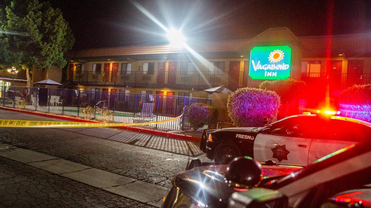 Fresno police investigates a shooting at a Vagabond Inn in southeast Fresno Friday, Aug. 14, 2020