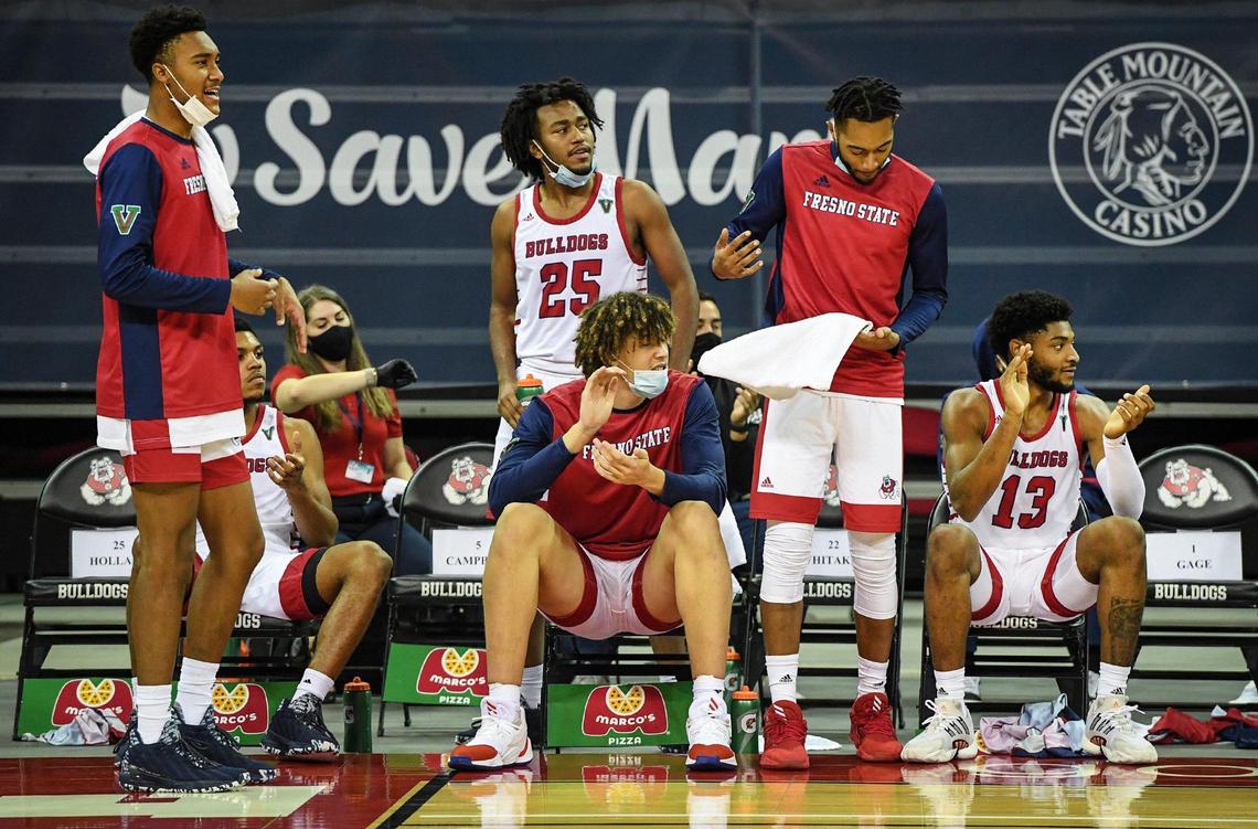 Fresno State’s bench erupts after a score against Wyoming during their game at the Save Mart Center on Monday, Jan. 4, 2021.