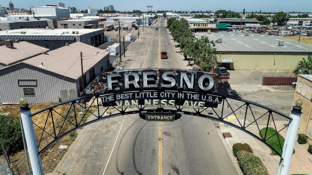 The Van Ness Avenue arch, which dates back to 1929, stretches over the roadway south of downtown Fresno on Thursday, May 17, 2023. Mayor Jerry Dyer presented his fiscal year 2024 mayor’s budget during a news conference at City Hall on Thursday.