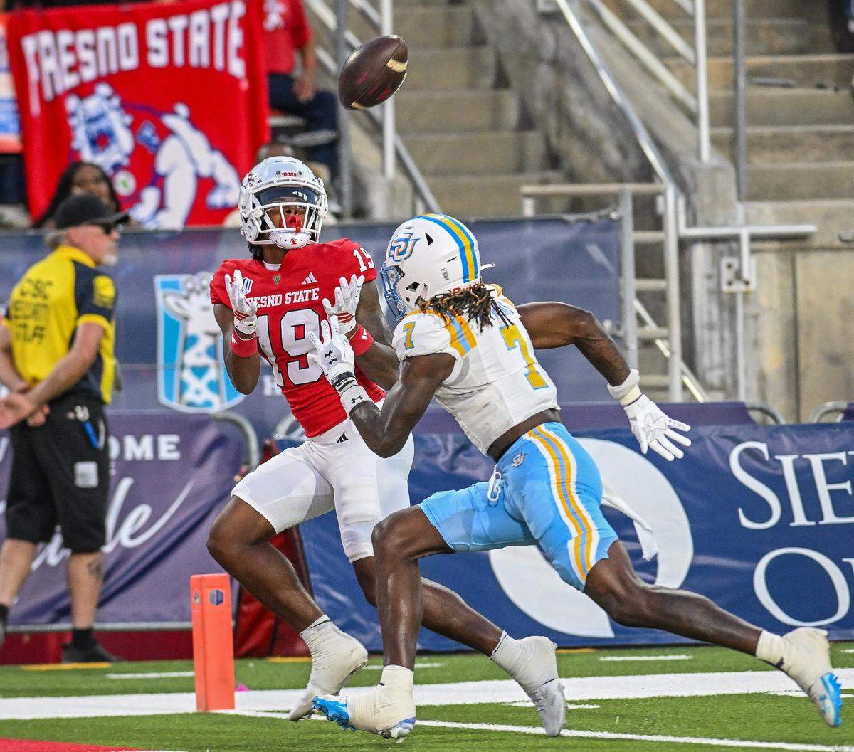 Fresno State's Harold Duvall, left lets the ball fall into his hands at the goal line for a touchdown while defended by Souther University's Zay Franks in the first half of their game at Valley Children's Stadium in Fresno on Saturday, Sept. 13, 2025. 